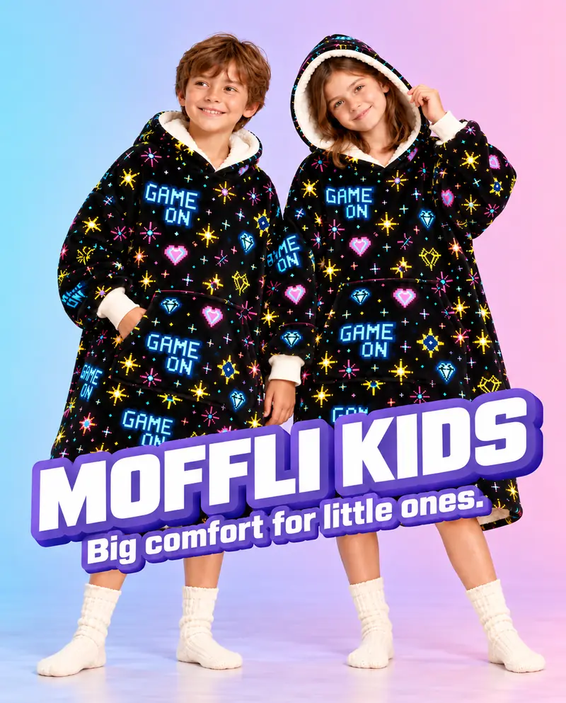 Two children wearing black wearable blankets with a Game On pattern and the words Moffli Kids — Big comfort for little ones.